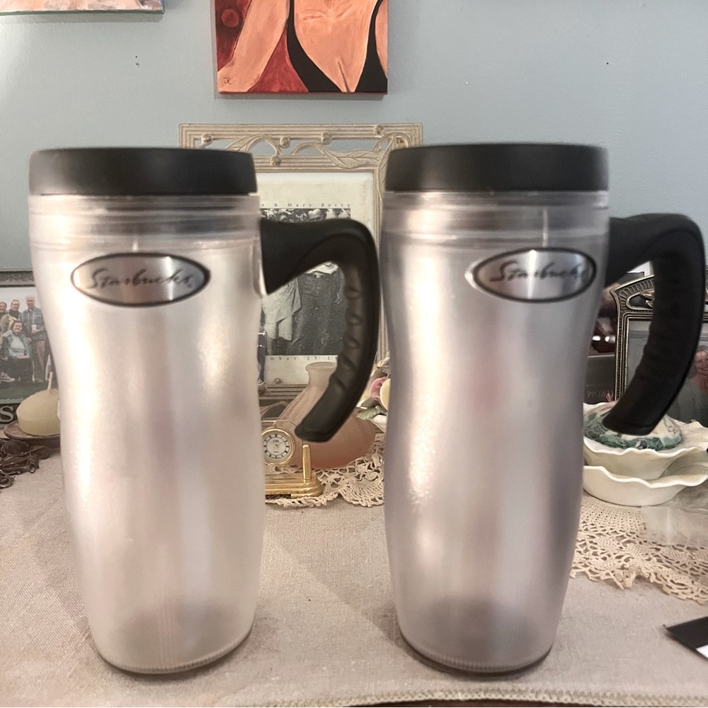 Two Starbucks plastic travel tumblers, handles, 16 oz
